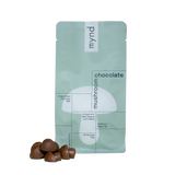 Green packaging of mynd chocolate with mushrooms on a white background