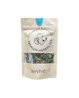A supplement container of Revive Premium Herbal Tea by Enhanced Wellbeing